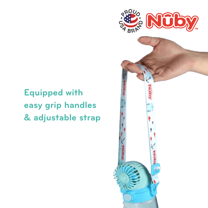Astra Family A baby is holding a blue nuby fan with an easy grip handle and adjustable strap.