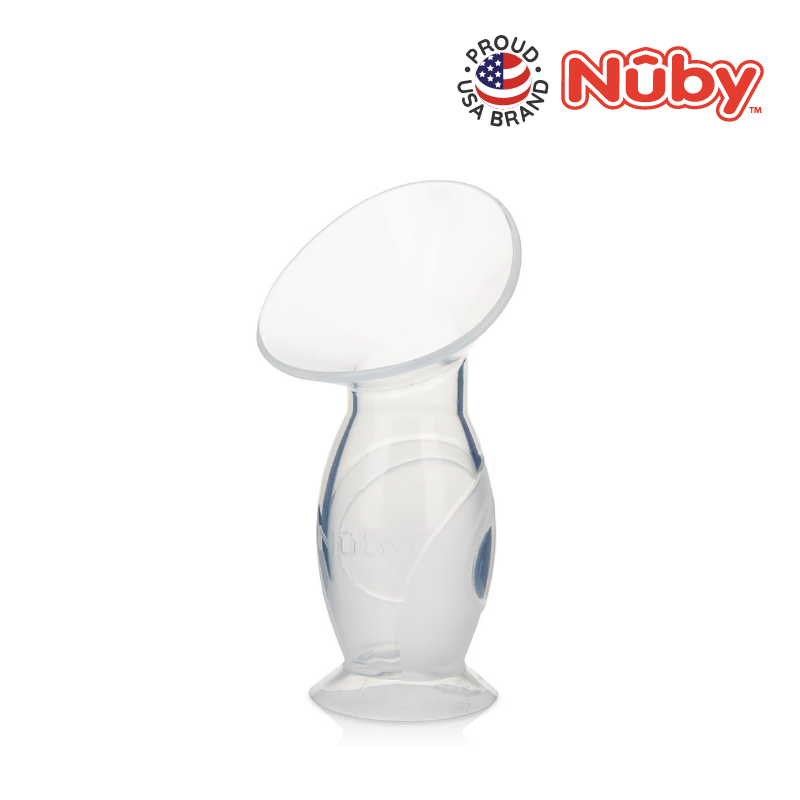 Astra Family A clear plastic cup with the words Nuby Comfort Manual Breast Milk Collector (Milk Container) on it.