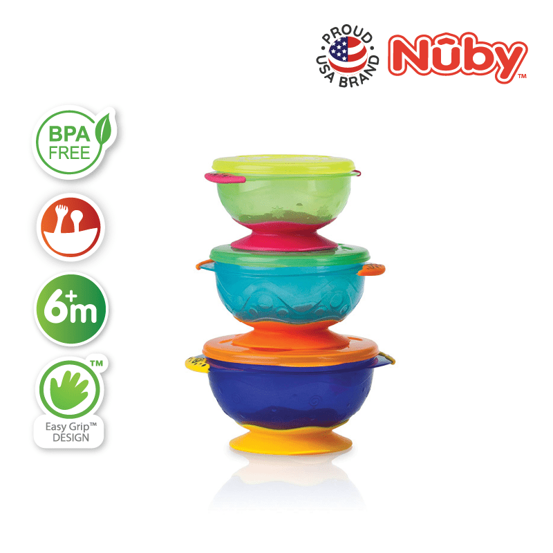 Astra Family A stack of colorful bowls with the nuby logo on them.