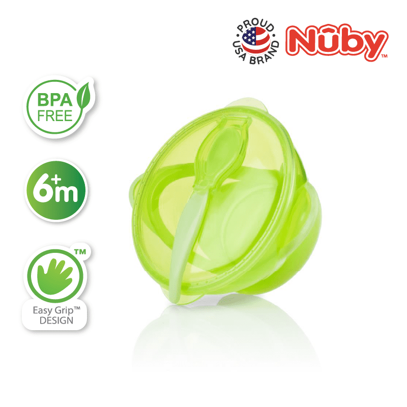 Astra Family A green plastic bowl with a spoon and utensils.