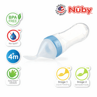 Astra Family The nuby baby bottle is shown with a number of different labels on it.