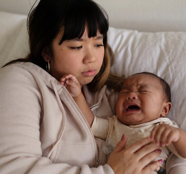 You try rocking, patting, 
feeding, again and again