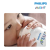 Astra Family A baby is drinking from a bottle with the words philips avent.