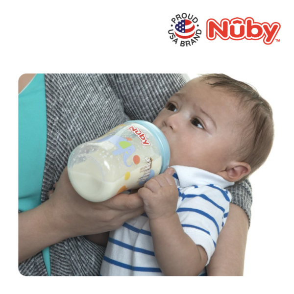 Astra Family A woman using a Nuby Natural Touch Printed Bottle with Slow Flow Nipple to feed her baby.