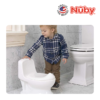 Astra Family A baby is potty training on a Nuby Potty.