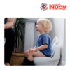 Astra Family A toddler is using a Nuby Potty during potty training.