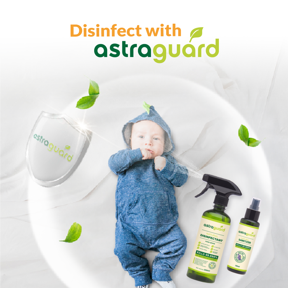 Astra Family A baby is lying on a bed with the words disinfect with astroguard.