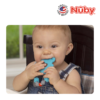 Astra Family A baby is using a Nuby Silicone Beaded Pacifinder with Teether in his high chair.