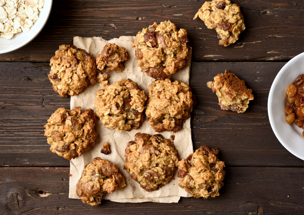 Astra Family A plate of oatmeal lactation cookies on a wooden table.