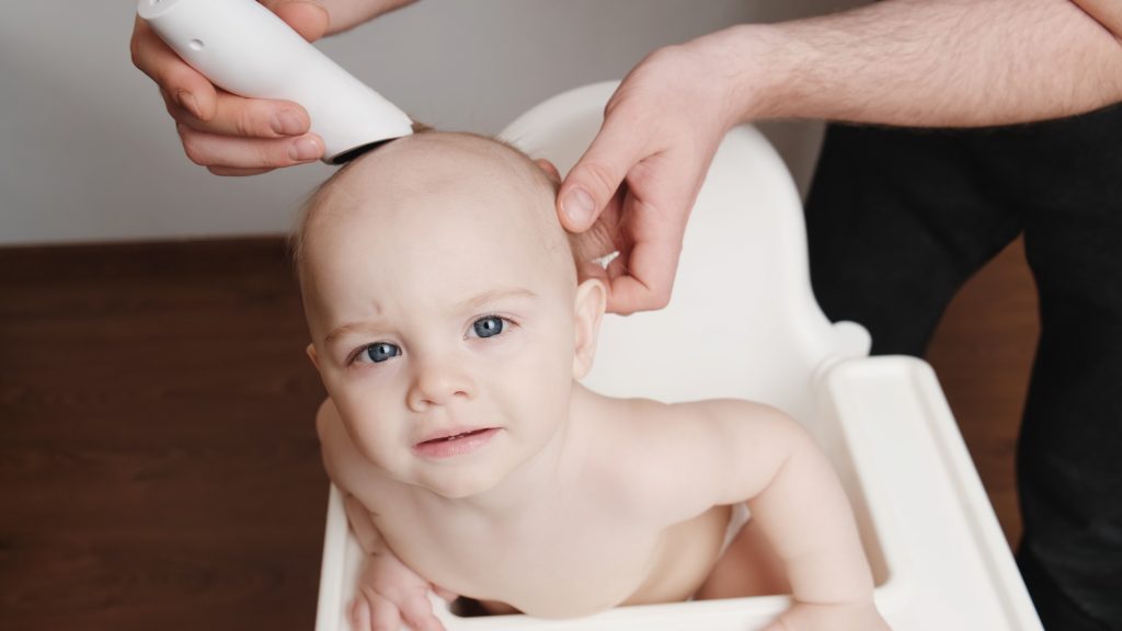 Astra Family A baby's hair being shaved in a high chair explores the truth or myth behind shaving to make it thicker.
